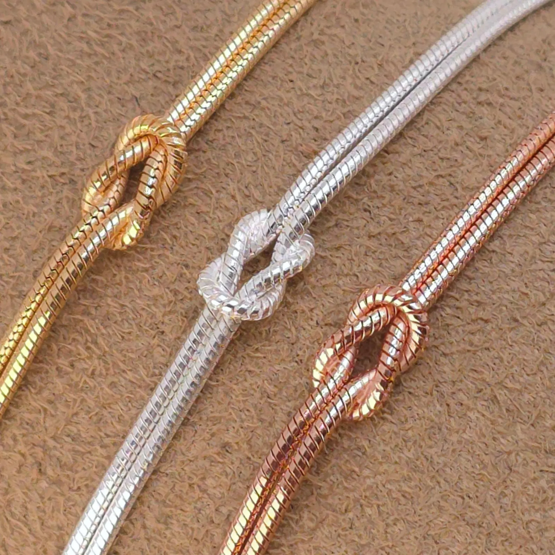 Eternal Knot Armband | Unterstütze Brustkrebs (1+1 GRATIS)