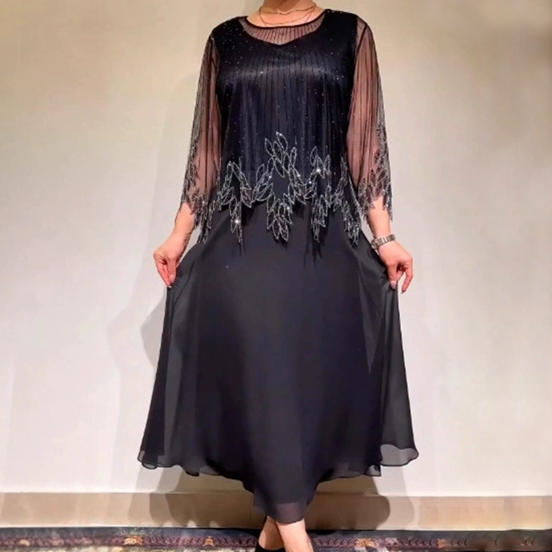 Eliza – Elegantes Kleid mit schimmernder Overlay-Schicht