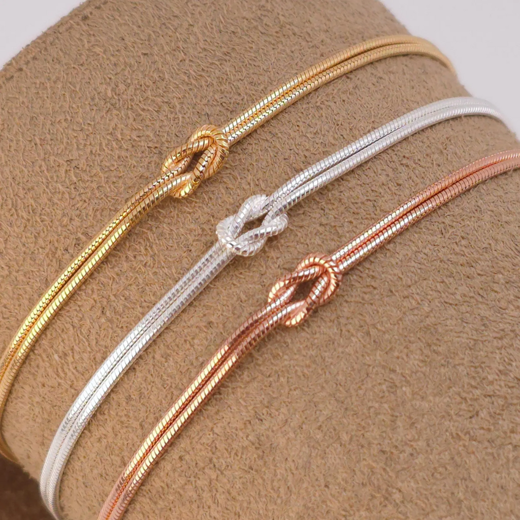 Eternal Knot Armband | Unterstütze Brustkrebs (1+1 GRATIS)