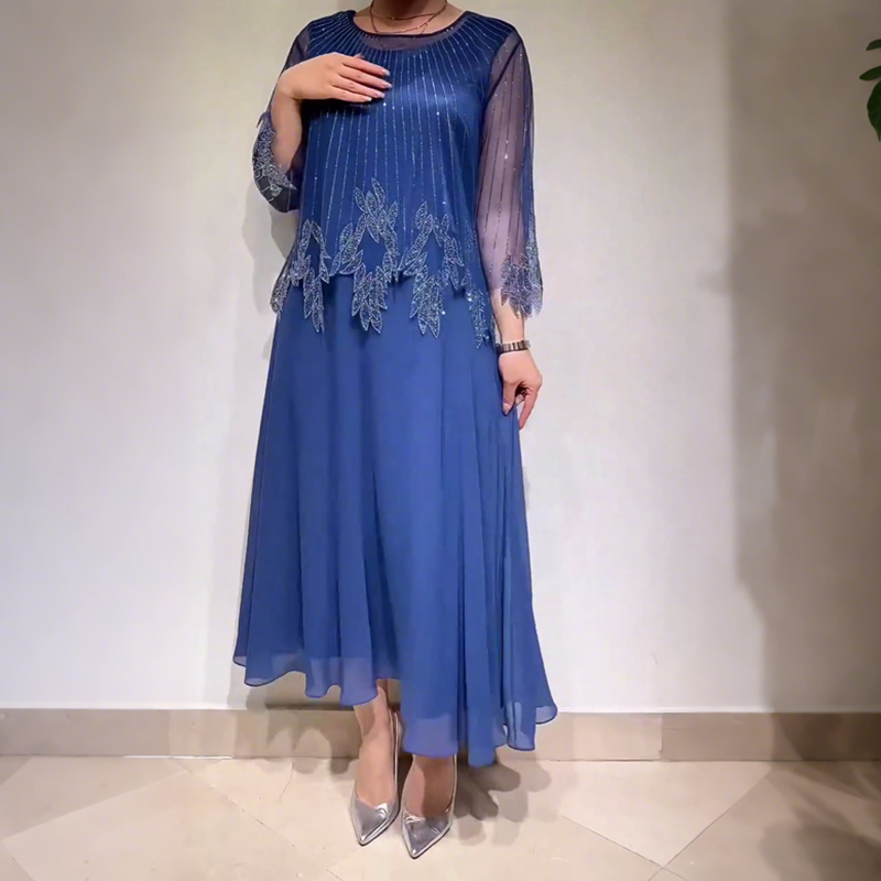 Eliza – Elegantes Kleid mit schimmernder Overlay-Schicht