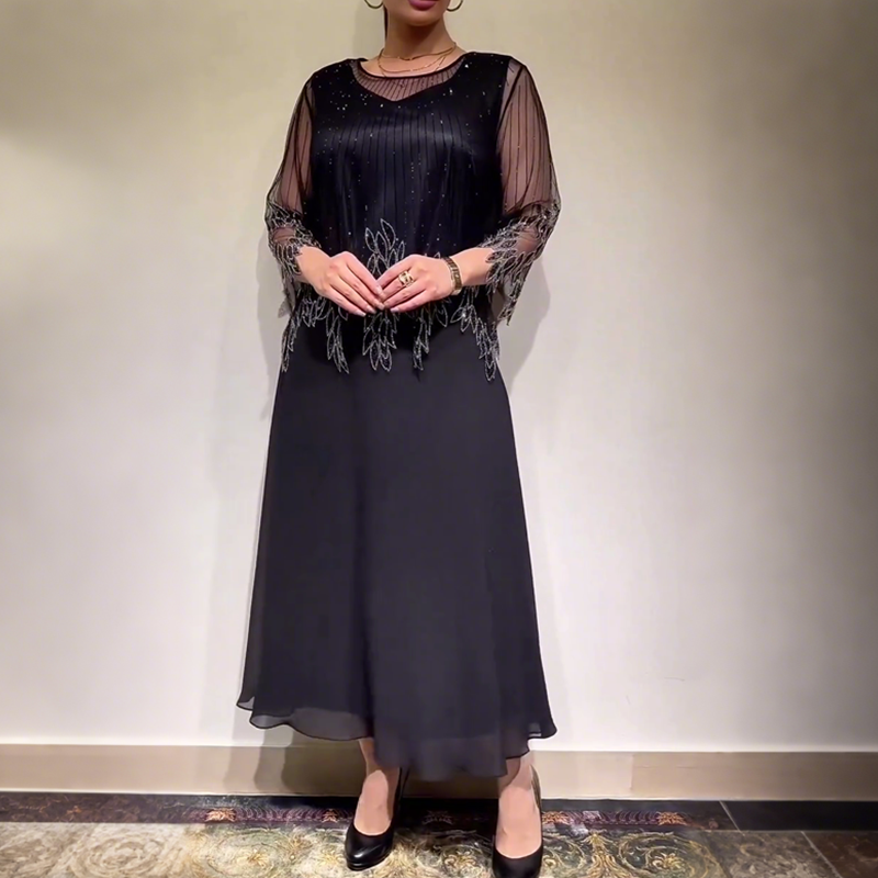 Eliza – Elegantes Kleid mit schimmernder Overlay-Schicht