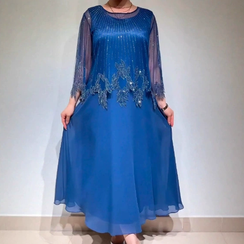 Eliza – Elegantes Kleid mit schimmernder Overlay-Schicht