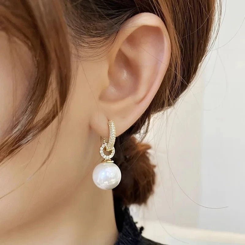Elegante Ohrringe mit Perlen